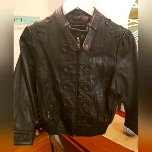 Genuine leather military jacket with 3/4 sleeves. Size medium